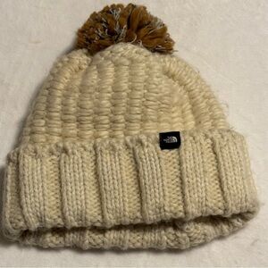 The North Face Women’s Cream Knitted Stylish Beanie with Brown Pom-Pom